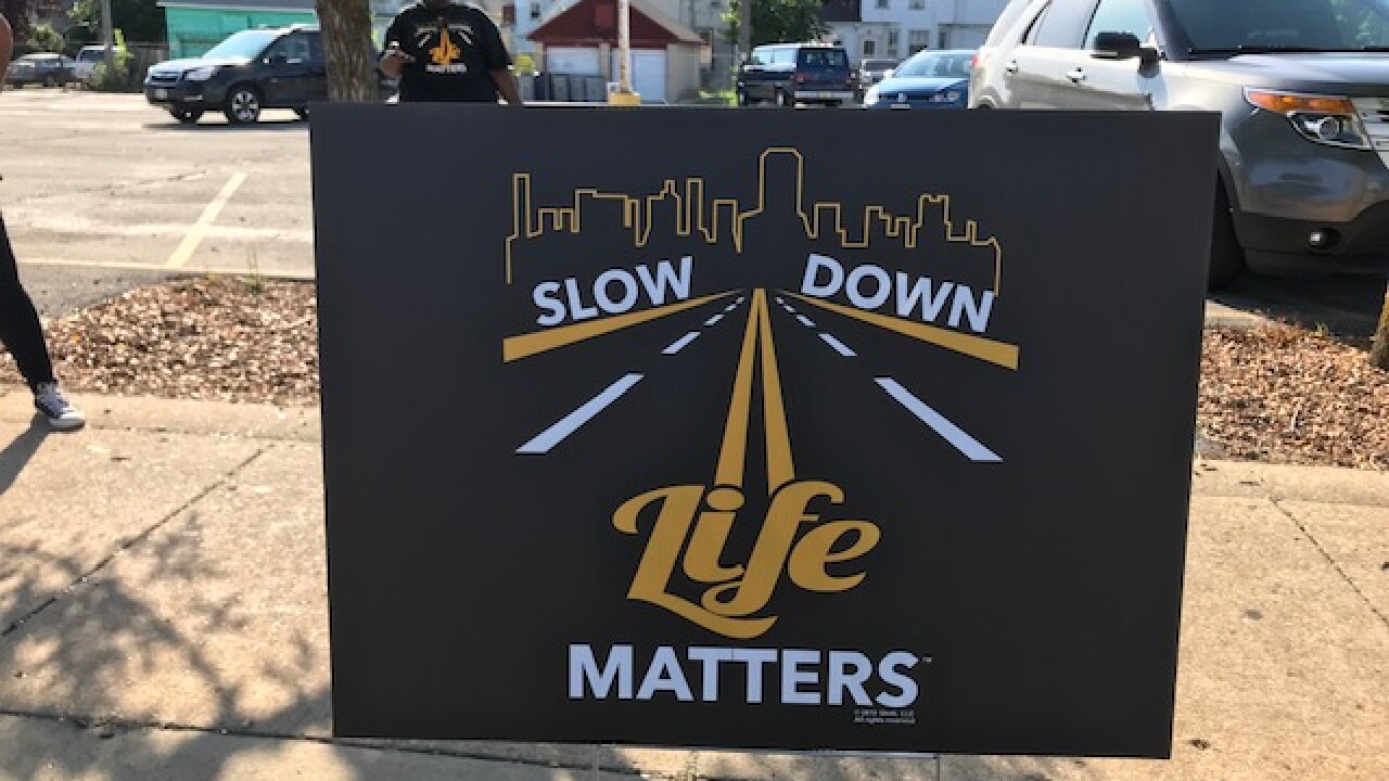 Sign reads Slow Down Life Matters